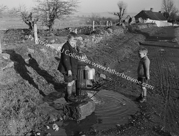 CHILDREN AT VILLAGE PUMP